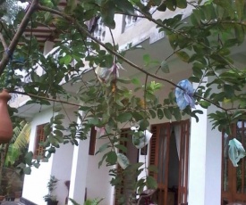 Thilak House